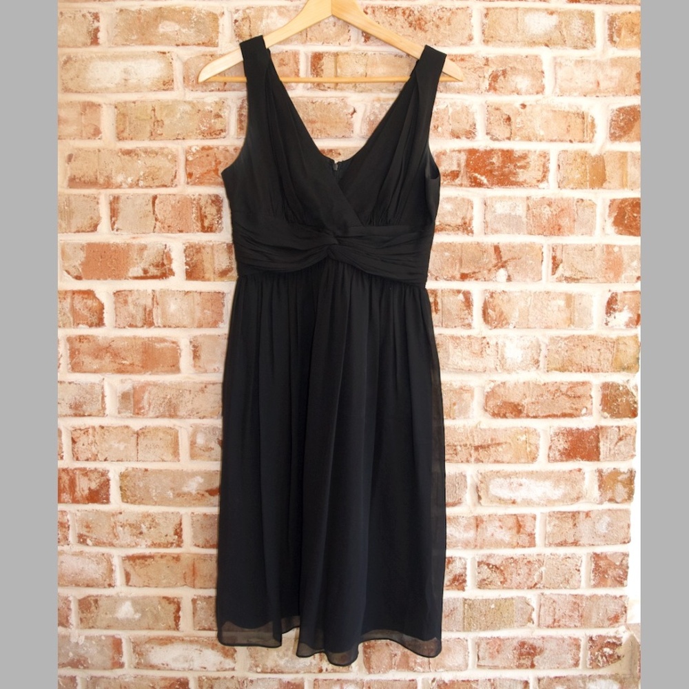 Donna Morgan women's black knee length sleeveless cocktail dress, size 4